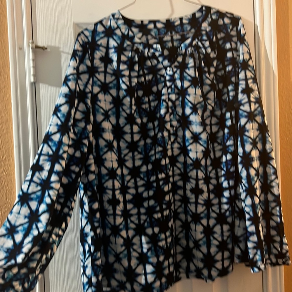 Beautiful blue and black design shirt with sleeve buttons.
